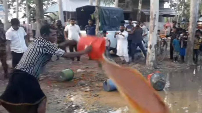 বিরামপুরে যৌথ অভিযানে বিপুল পরিমাণ চোলাই মদ জব্দ ও ধ্বংস